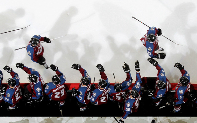 Ski stunt uniformed performers crowd free wallpaper for desktop - medium preview image