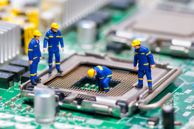 Close up computer motherboard workers free wallpaper for desktop - medium preview image