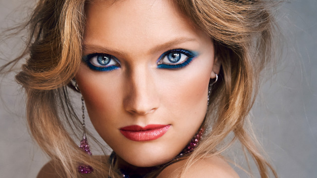 Woman blue eyes necklace repeated free wallpaper for desktop - medium preview image