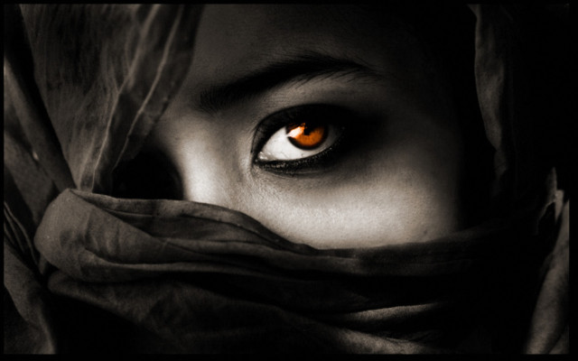 Woman orange eyes scarf serious #2 free wallpaper for desktop - medium preview image