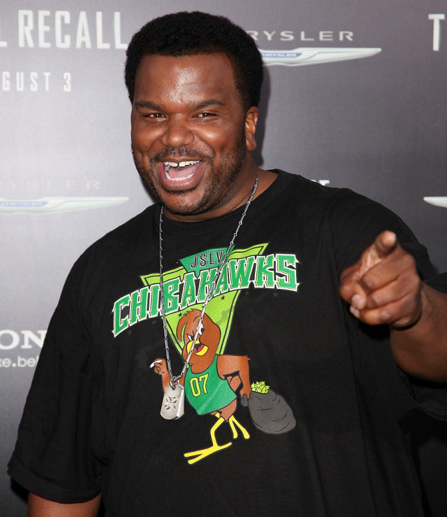 Man black shirt pointing green free wallpaper for tablet - medium preview image