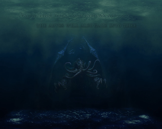 Large squid swimming ocean man free wallpaper for desktop - medium preview image