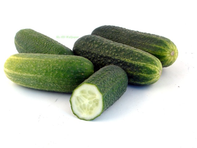 Cucumbers half cut middle white free wallpaper for desktop - medium preview image