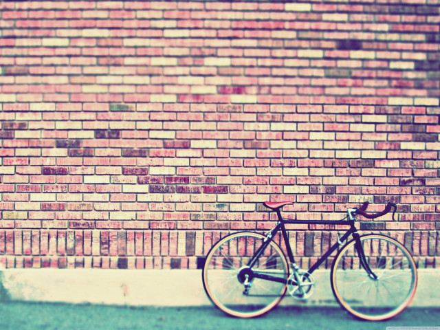 Bicycle brick wall sidewalk building free wallpaper for desktop - medium preview image