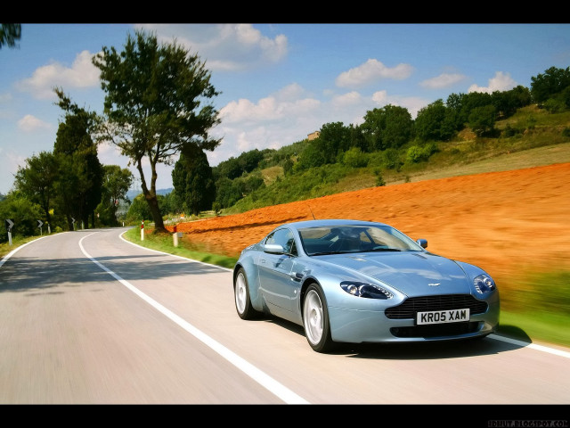 Blue sports car country road free wallpaper for desktop - medium preview image