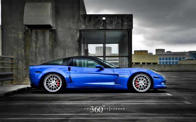 Blue sports car parking lot #6 free wallpaper for desktop - medium preview image