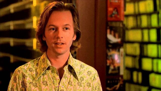 Man yellow shirt smiling flower free wallpaper for desktop - medium preview image