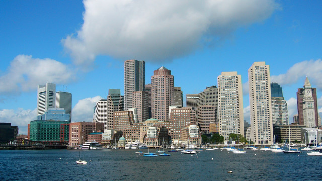City skyline boats water clouds free wallpaper for desktop - medium preview image