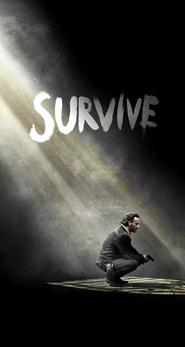 Man kneeling spotlight stage survive free wallpaper for mobile - medium preview image