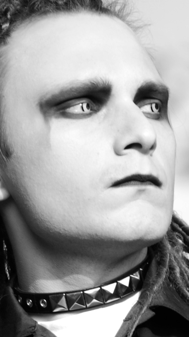 Man spiked collar black leather free wallpaper for mobile - medium preview image