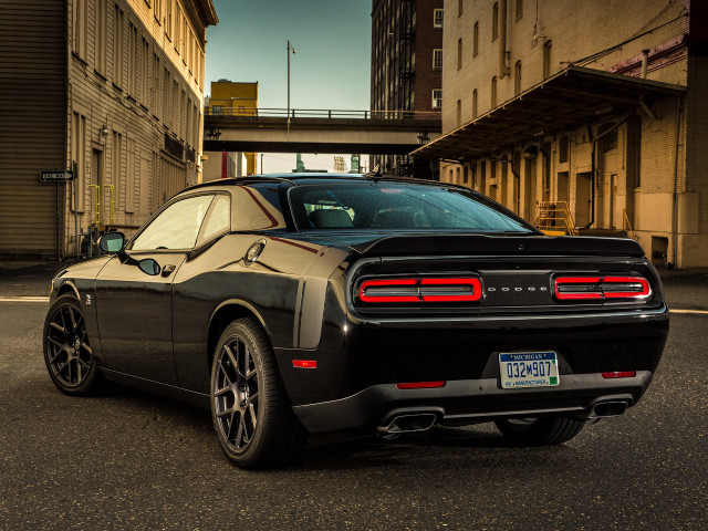 Black sports car city street free wallpaper for desktop - medium preview image
