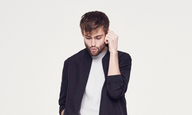 Bearded man black jacket phone free wallpaper for desktop - medium preview image