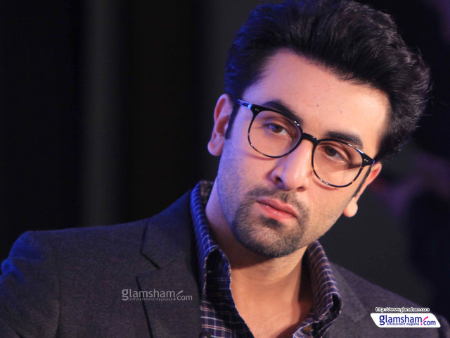 Man glasses serious look camera free wallpaper for desktop - medium preview image