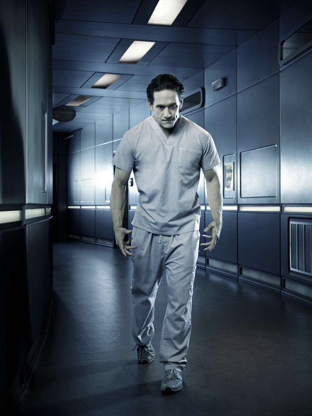 Man prison uniform hallway jail free wallpaper for mobile - medium preview image