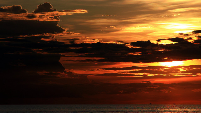 Sunset boat water clouds sky free wallpaper for desktop - medium preview image