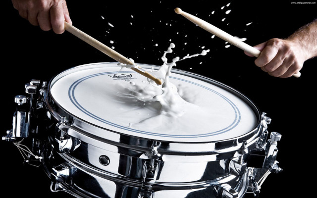 Person playing drum splashing white free wallpaper for desktop - medium preview image