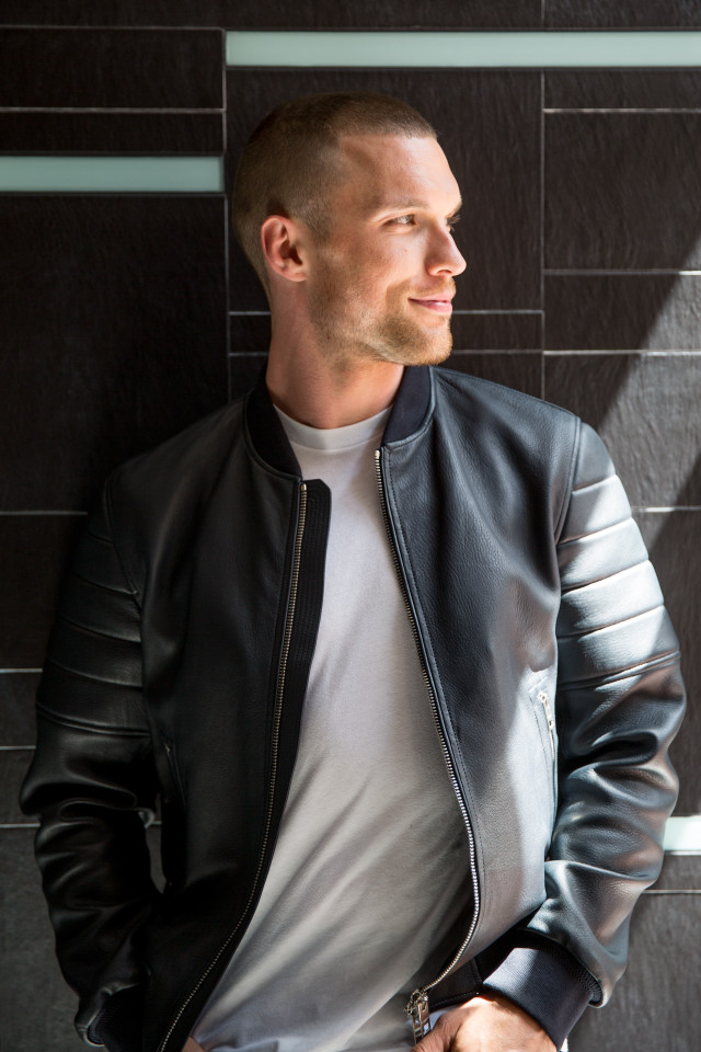 Man leather jacket wall portrait free wallpaper for mobile - medium preview image
