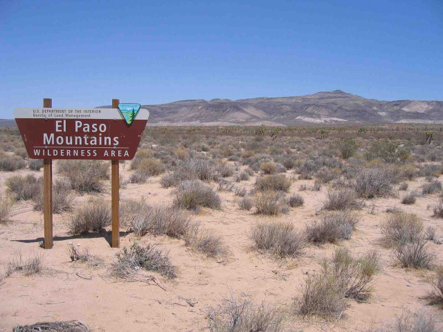 Desert sign mountains blue sky free wallpaper for desktop - medium preview image