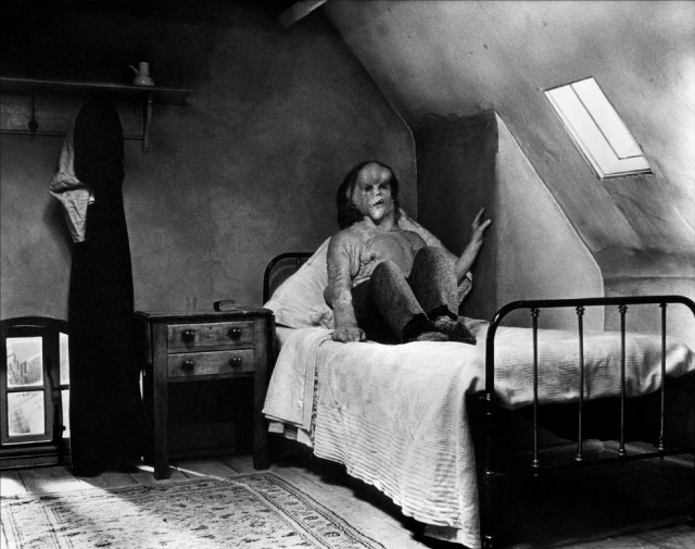 Woman sitting bed room slanted free wallpaper for desktop - medium preview image