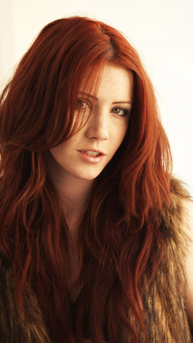 Woman red hair fur vest free wallpaper for mobile - medium preview image