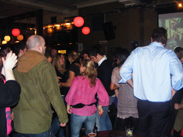 Group people projector screen red free wallpaper for desktop - medium preview image