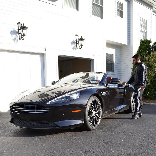 Man black car white building free wallpaper for tablet - medium preview image