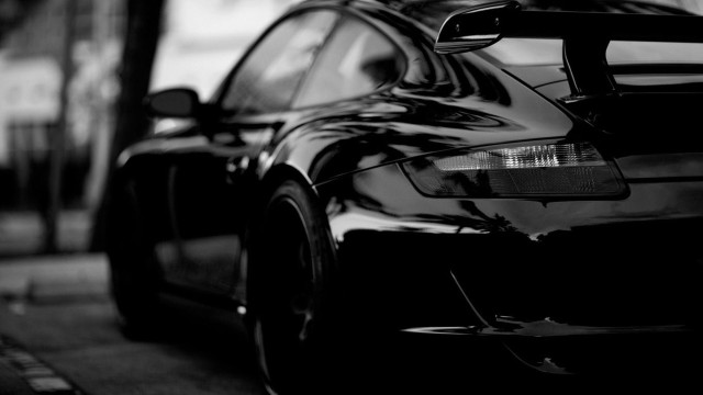Black car parked road building #5 free wallpaper for desktop - medium preview image