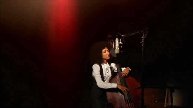 Woman microphone bass dark room free wallpaper for desktop - medium preview image