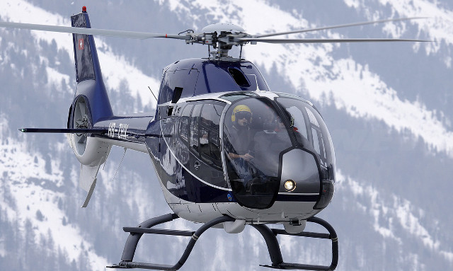 Helicopter flying snow covered mountain free wallpaper for desktop - medium preview image