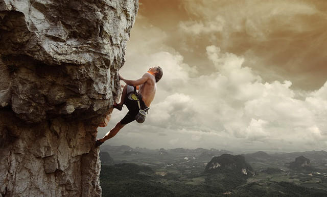 Man climbing mountain sky background free wallpaper for desktop - medium preview image
