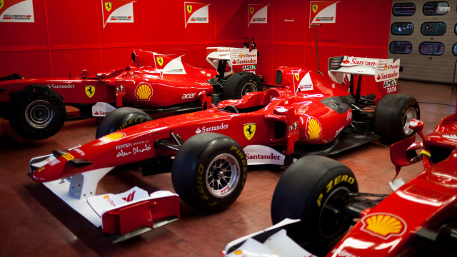 Red ferrari car garage parked free wallpaper for desktop - medium preview image