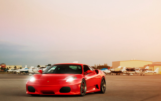 Red sports car parking lot #60 free wallpaper for desktop - medium preview image