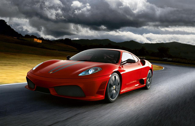 Red sports car cloudy sky free wallpaper for desktop - medium preview image