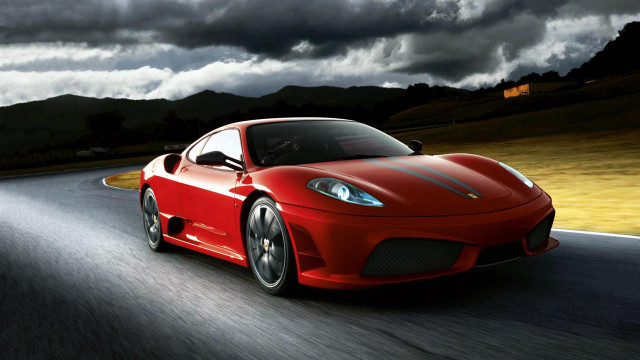 Red sports car cloudy mountain free wallpaper for desktop - medium preview image