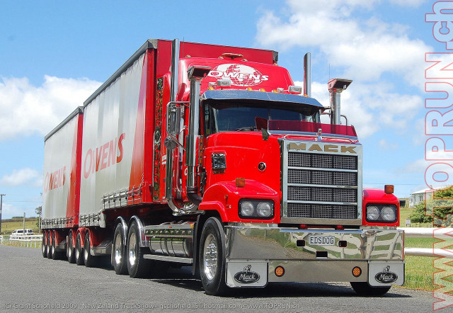 Red truck driving road sky free wallpaper for desktop - medium preview image