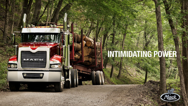 Truck driving dirt road woods free wallpaper for desktop - medium preview image