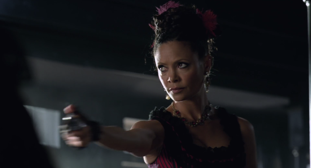 Woman gun dark room afrofuturism free wallpaper for desktop - medium preview image