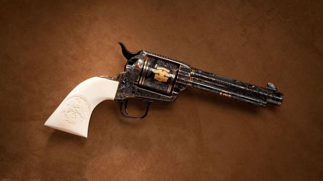 Gun white handle gold emblem free wallpaper for desktop - medium preview image