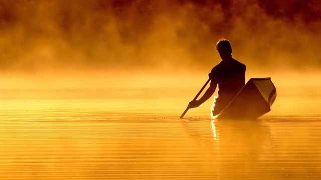 Man paddling canoe lake sunset #3 free wallpaper for desktop - medium preview image