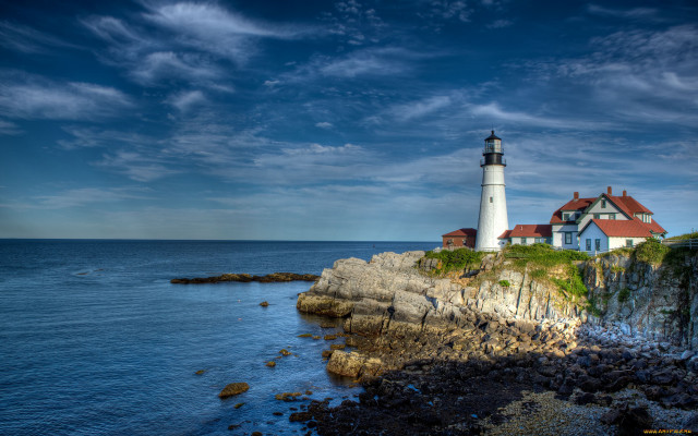 Lighthouse rocky cliff ocean cloudy free wallpaper for desktop - medium preview image