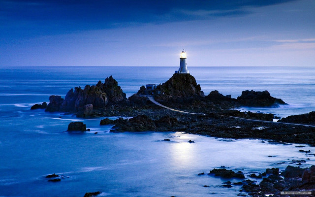 Lighthouse rocky shore night full free wallpaper for desktop - medium preview image