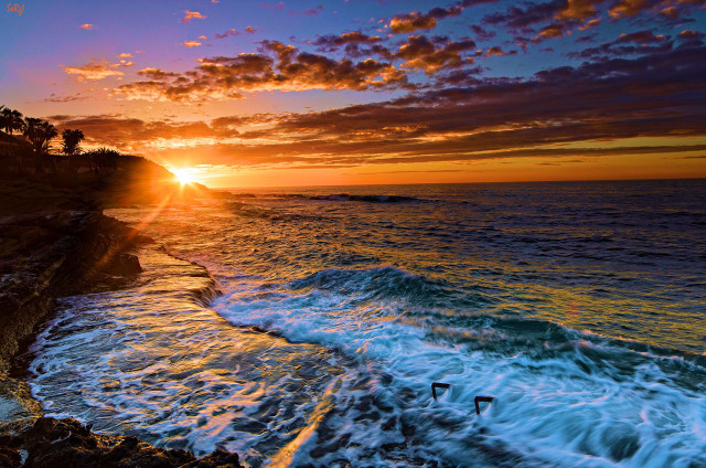 Sunset ocean waves crashing swimmer free wallpaper for desktop - medium preview image