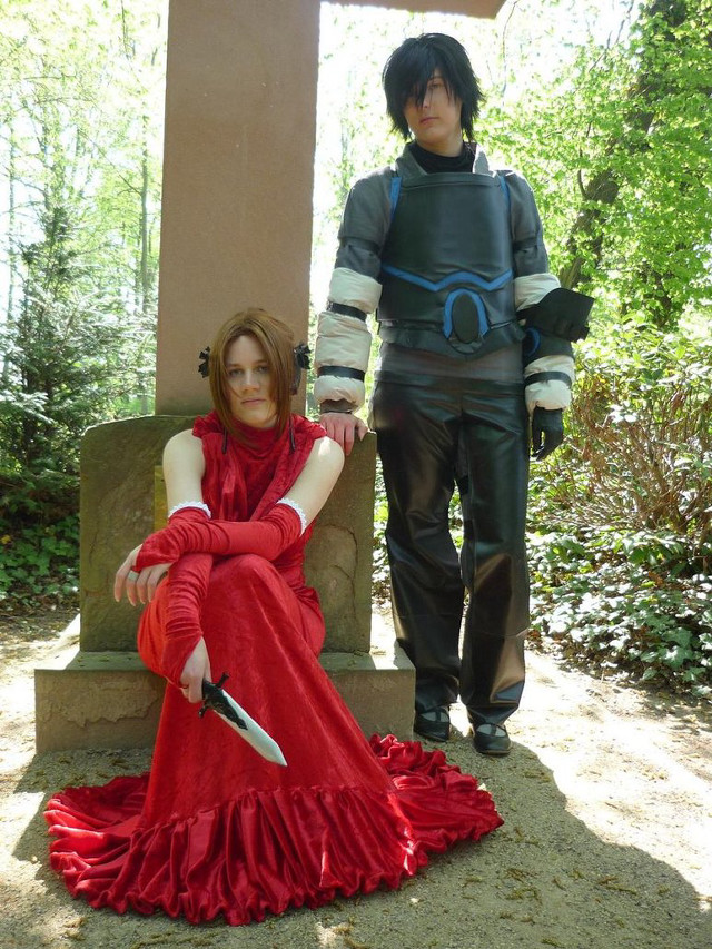 Woman red dress man costume free wallpaper for mobile - medium preview image