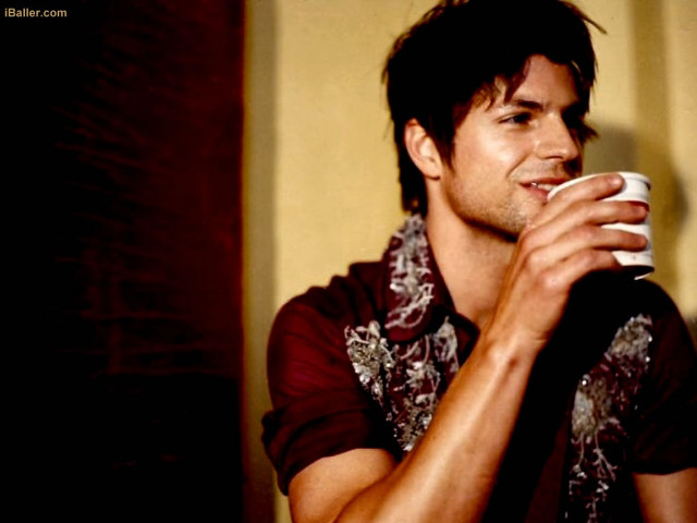 Man drinking coffee yellow wall free wallpaper for desktop - medium preview image