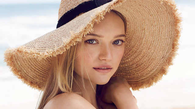 Woman hat beach arms neck free wallpaper for desktop - medium preview image