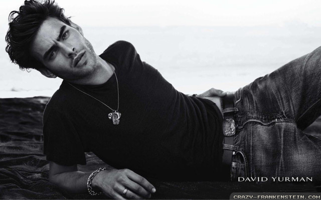 Man laying beach feet up free wallpaper for desktop - medium preview image