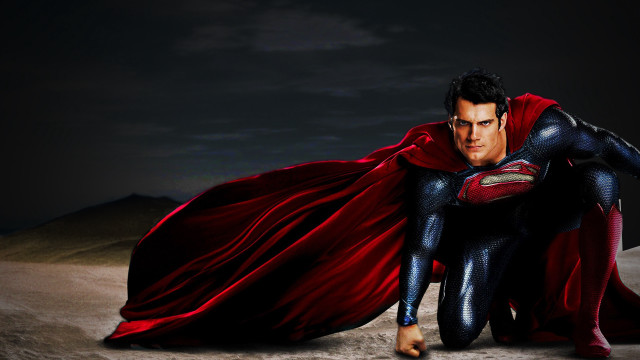 Man superman costume kneeling sand free wallpaper for desktop - medium preview image
