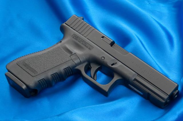 Gun blue cloth black handle #2 free wallpaper for desktop - medium preview image