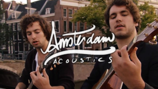 Two men playing guitars amantaan free wallpaper for desktop - medium preview image