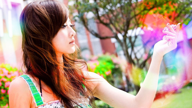 Woman holding pink flower rainbow free wallpaper for desktop - medium preview image